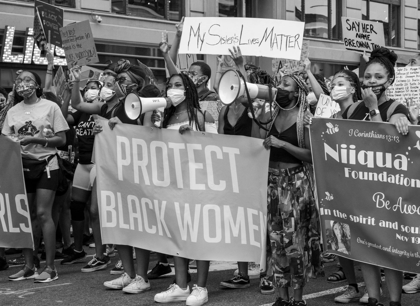 Source: Shutterstock, Julian Leshay, Protect Black Women and Girls Banner, New York, USA, July 26, 2020